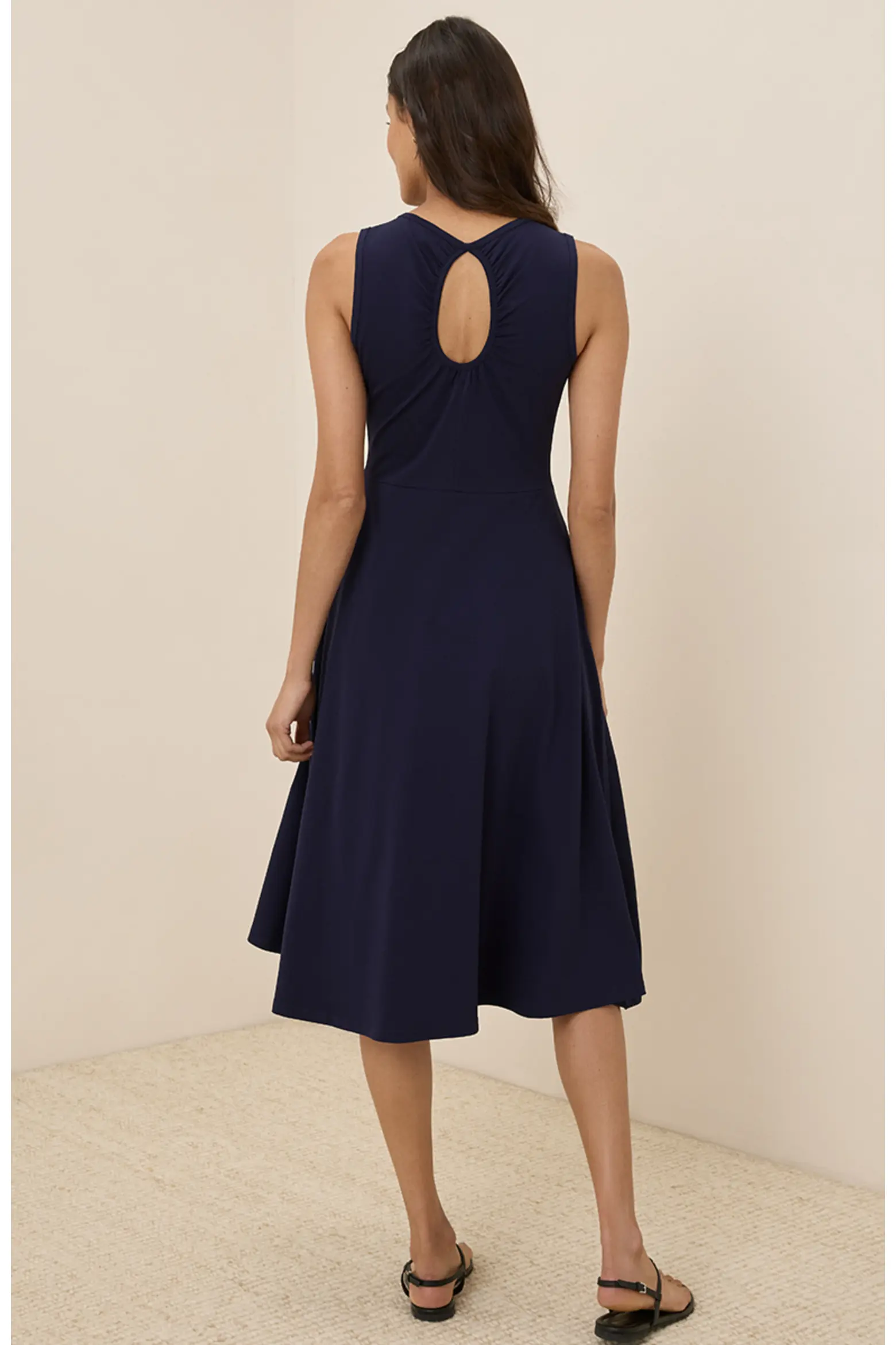 Navy sleeveless midi dress with keyhole cutout back detail